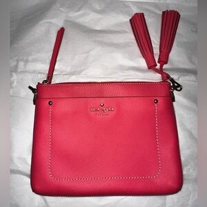 Kate Spade Thompson street flamingo pink leather clutch